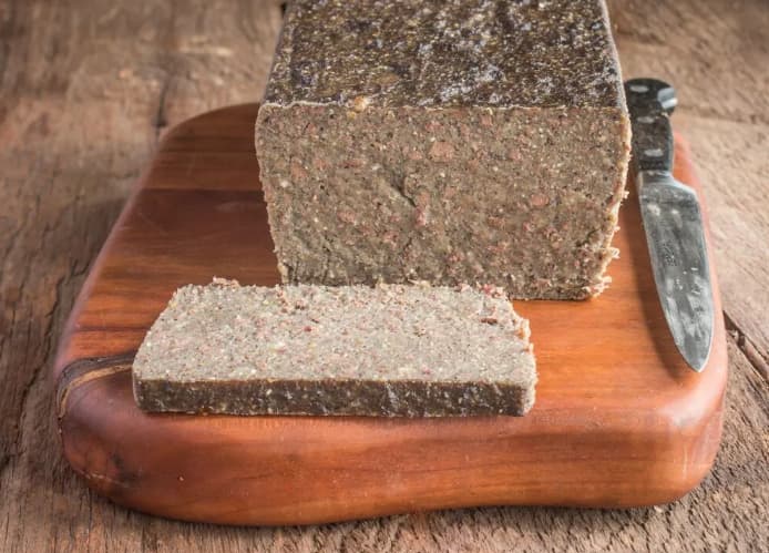 raw scrapple loaf before cooking